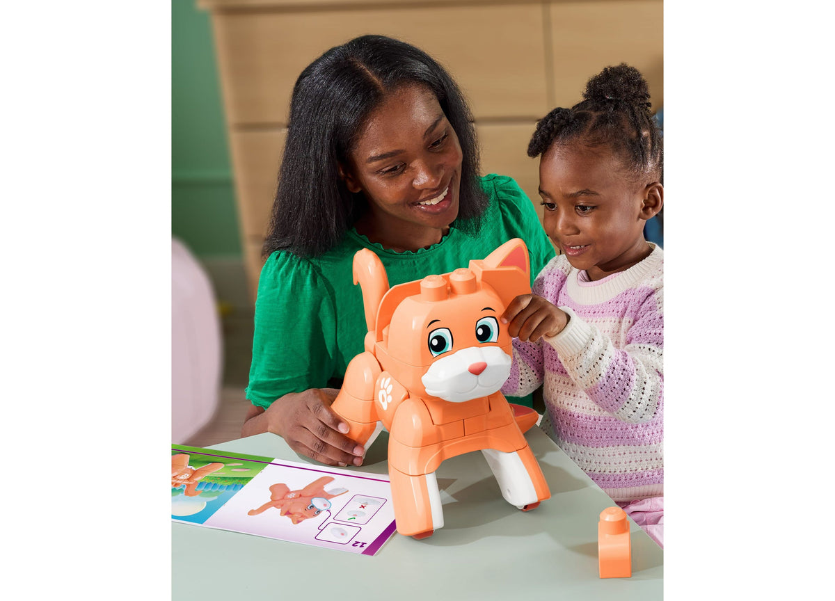 Mega Bloks Fisher-Price Rolling Kitten 3-in-1 25-Piece Building Set orange kitten with adult and child building together