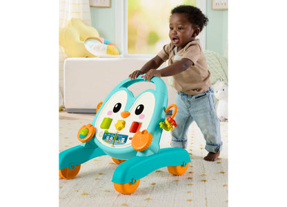 Fisher-Price 2-in-1 Musical Penguin Activity Walker in turquoise and orange with baby playing