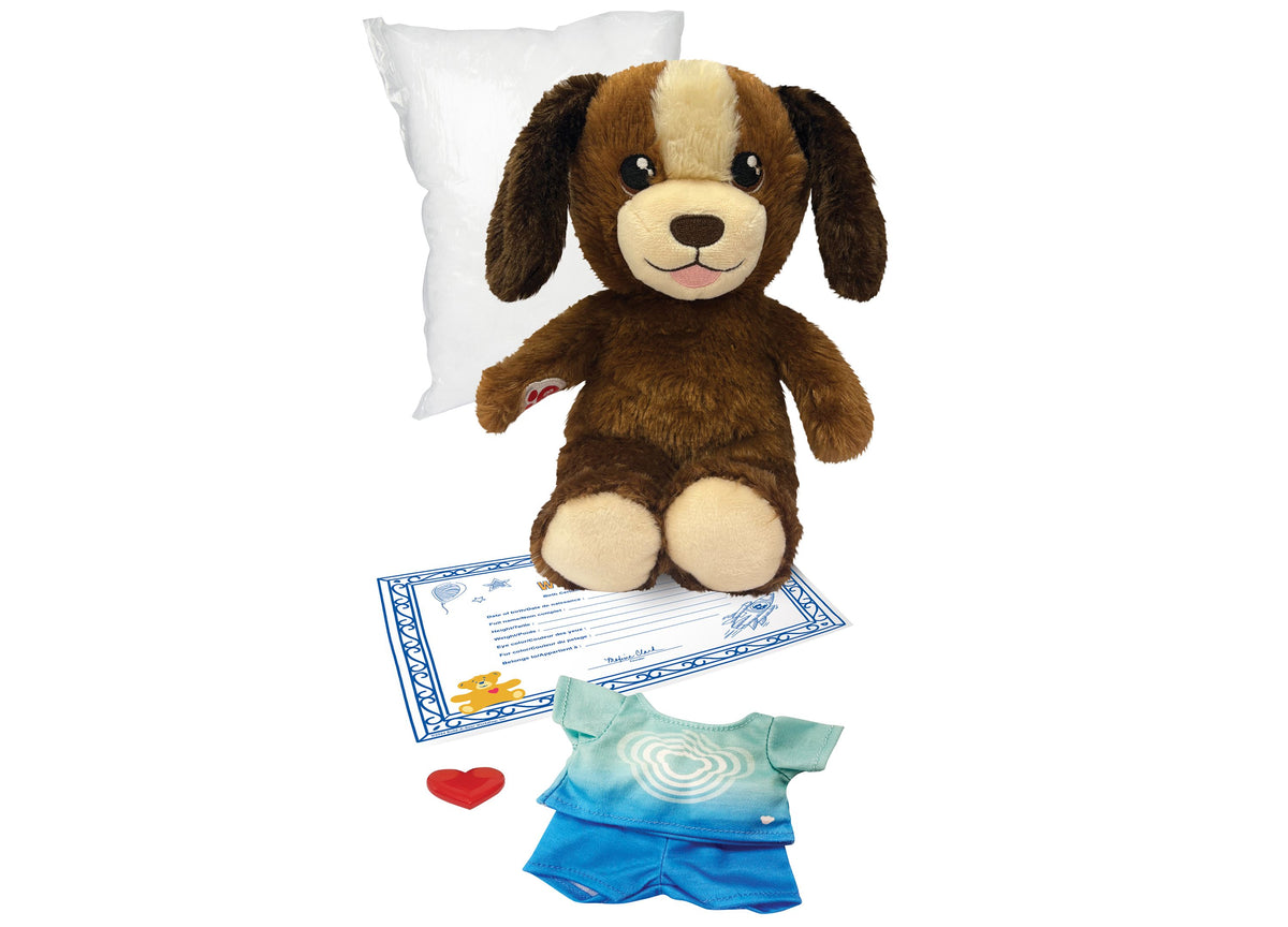 Casdon Puppy 9" Furtastic Friend Outfit Pack with brown and cream puppy, blue outfit, birth certificate, and red heart