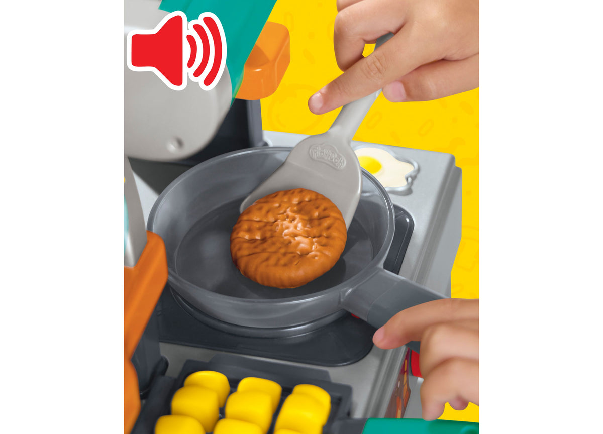 Play-Doh Super Sizzlin' Kitchen Playset with brown pretend burger sizzling in gray skillet, yellow fries below