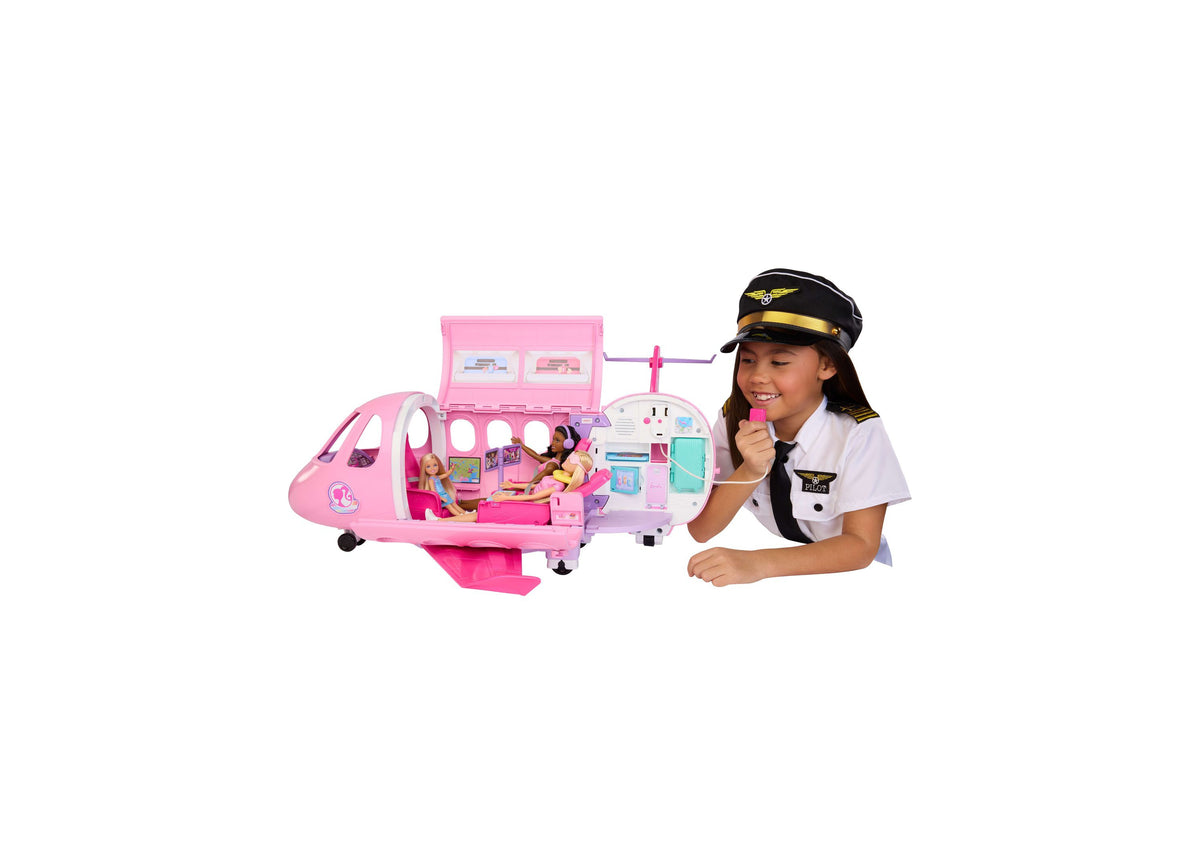 Barbie Dream Plane 15-Piece Airplane Playset in pink with child in pilot costume playing with microphone