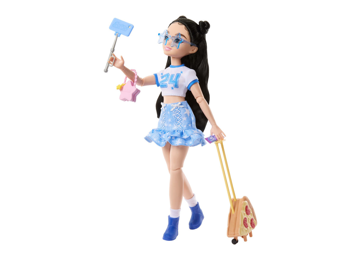 Barbie Dream Besties Renee doll in blue sports outfit with accessories including carry-on luggage and selfie stick