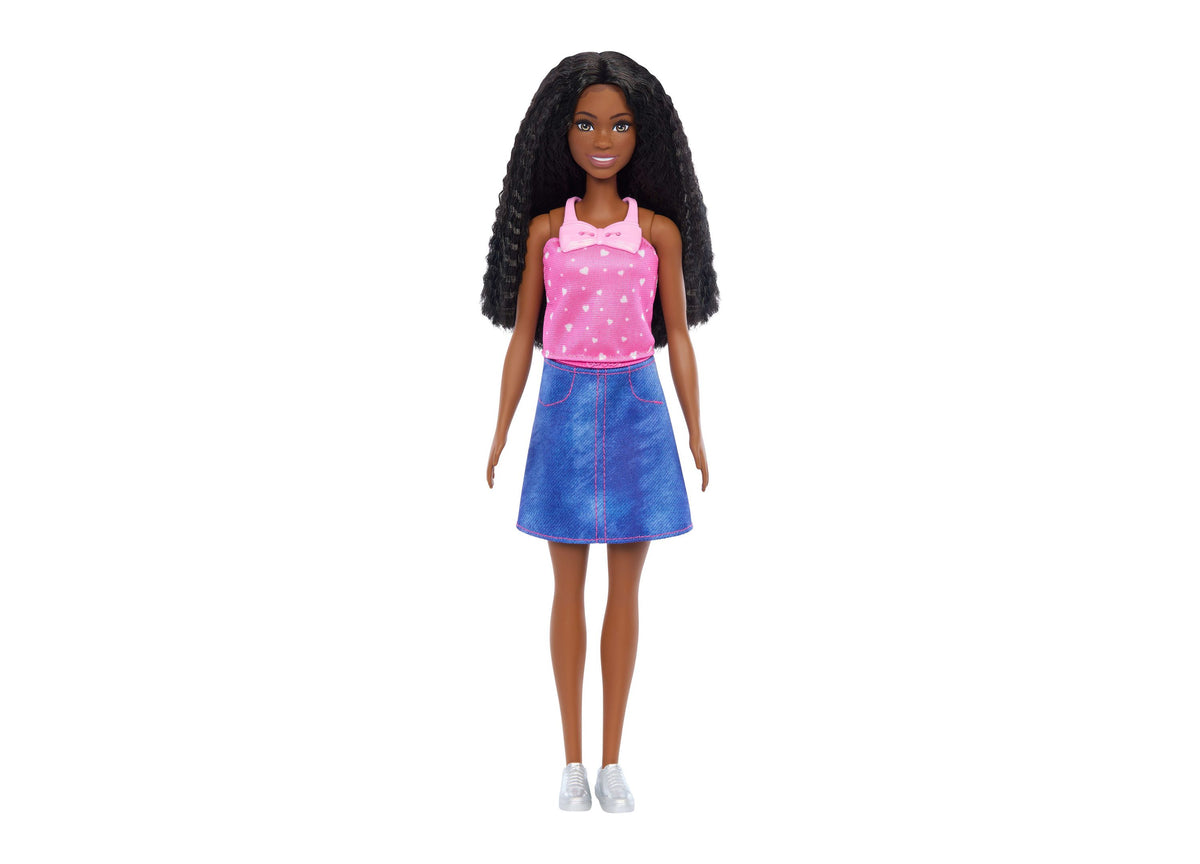 Barbie Brooklyn brunette doll wearing pink dotted top with bow and blue denim skirt