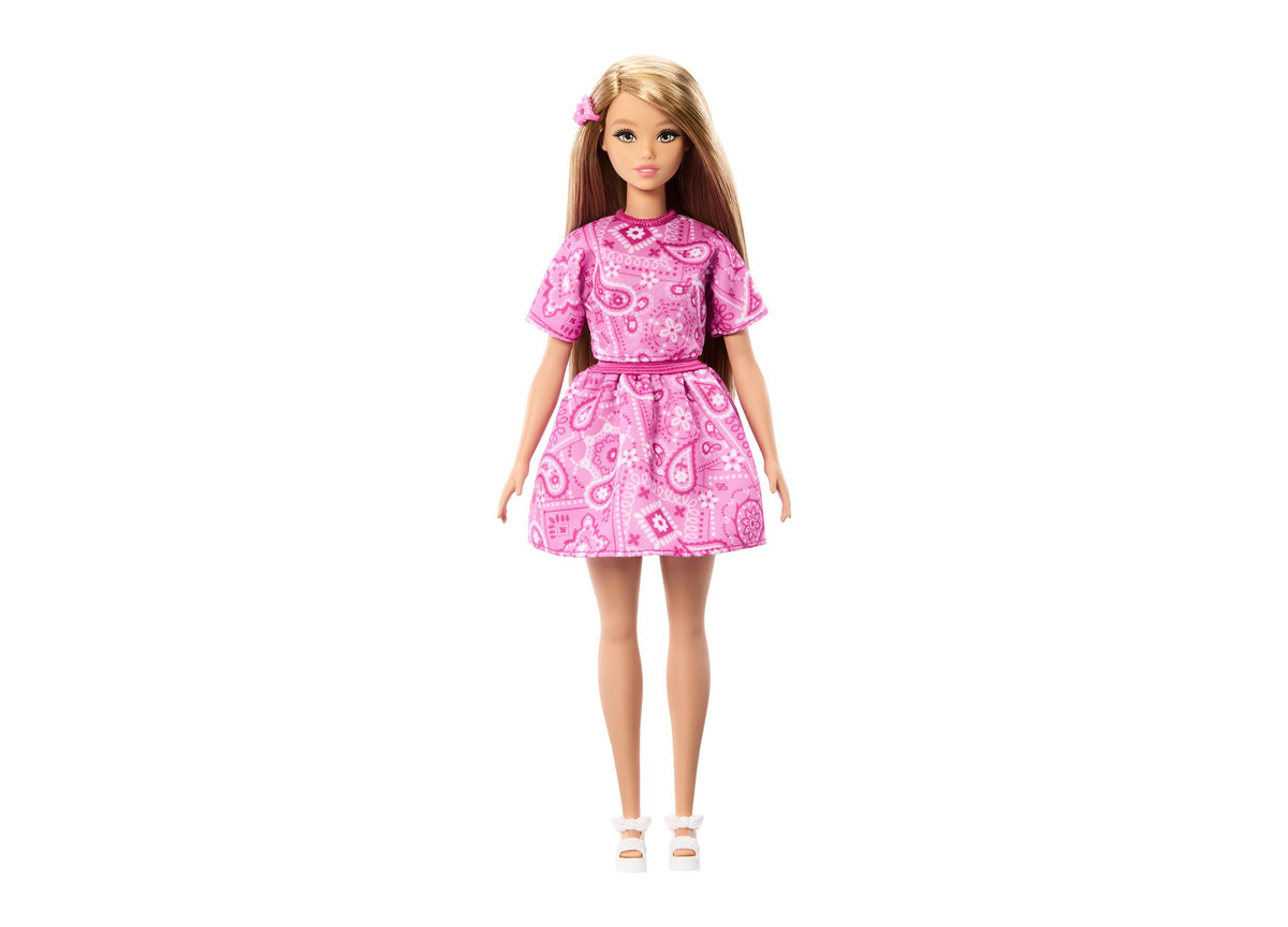 Barbie Fashionistas #249 doll wearing pink bandana-print dress with short sleeves and white sandals