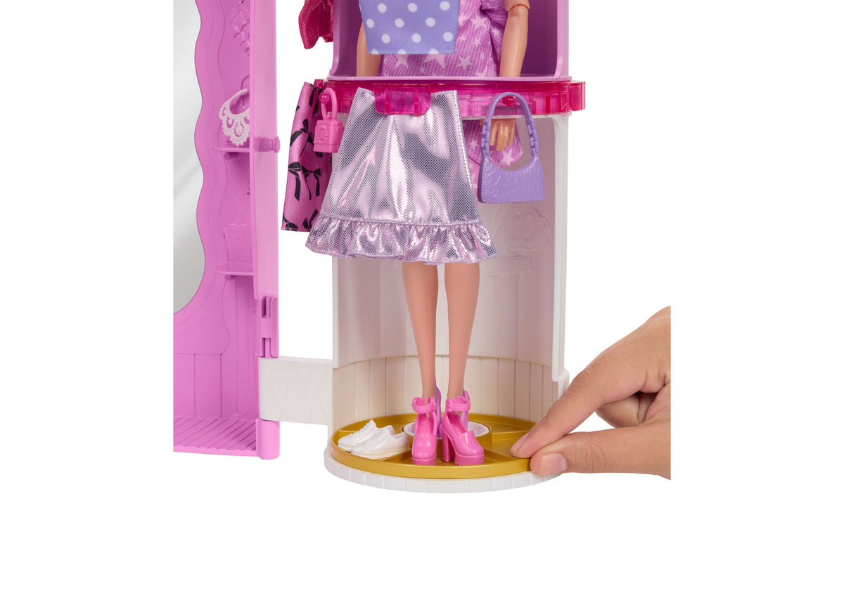 Barbie Deluxe Style Closet playset with doll in pink skirt, spin feature tube, and 20+ accessories