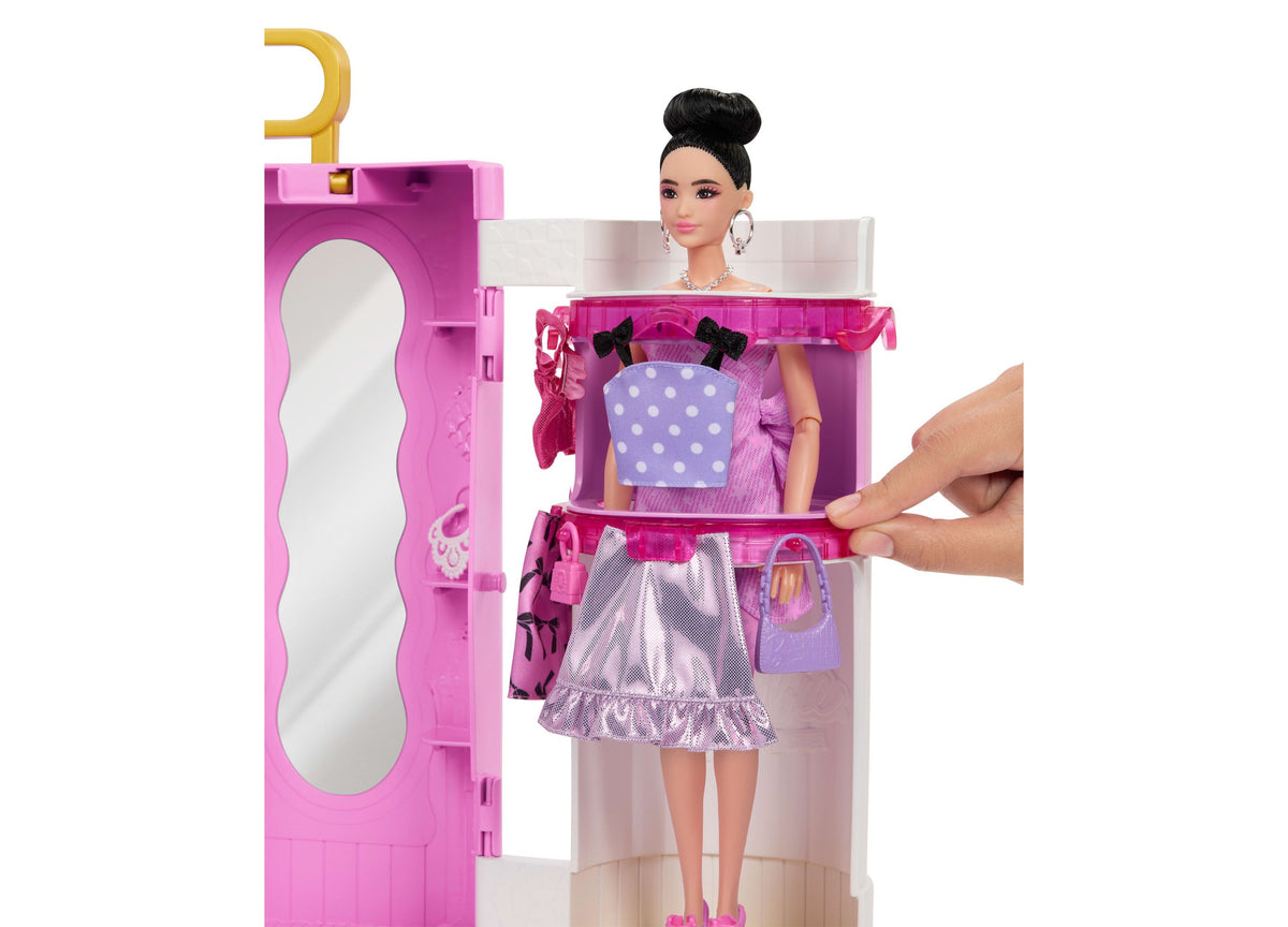 Barbie Deluxe Style Closet playset with pink closet, doll, and purple polka dot outfit