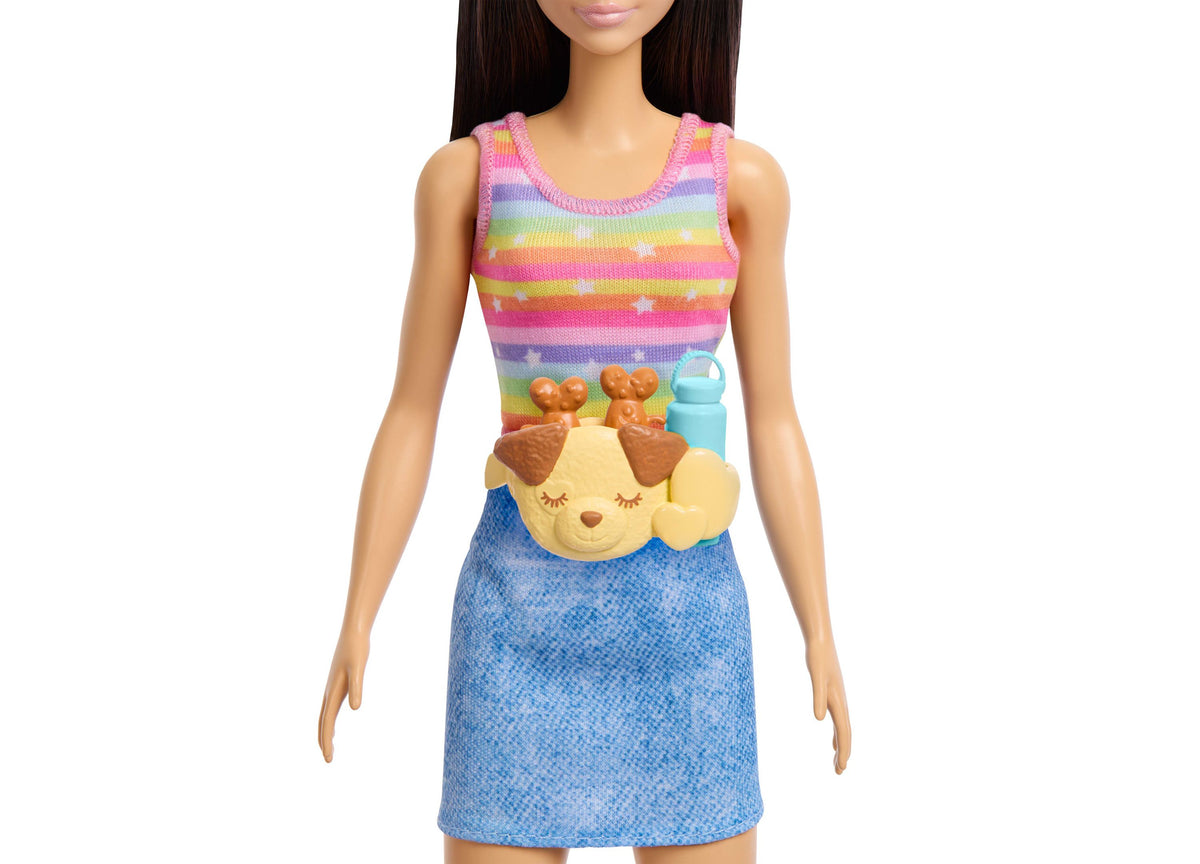 Barbie Skate and Run doll wearing rainbow striped top and blue skirt with roller-skating puppy accessory