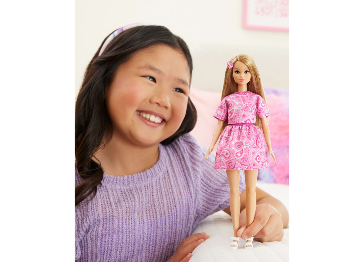 Barbie Fashionistas #249 doll wearing pink bandana-print dress with matching hair clip