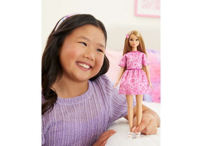Barbie Fashionistas #249 doll wearing pink bandana-print dress with matching hair clip