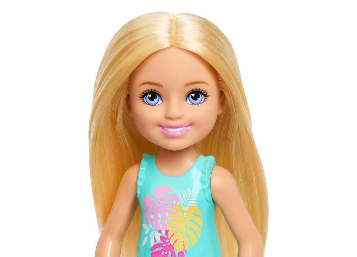 Barbie Chelsea doll with long blonde hair wearing turquoise tank top with colorful leaf design