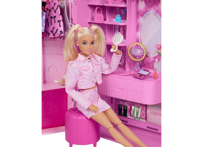Barbie Deluxe Style Closet playset with blonde doll in pink checkered outfit sitting at vanity mirror