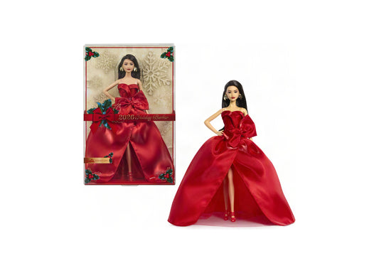 2026 Holiday Barbie Signature doll in red gown with bow detail, shown in packaging and displayed