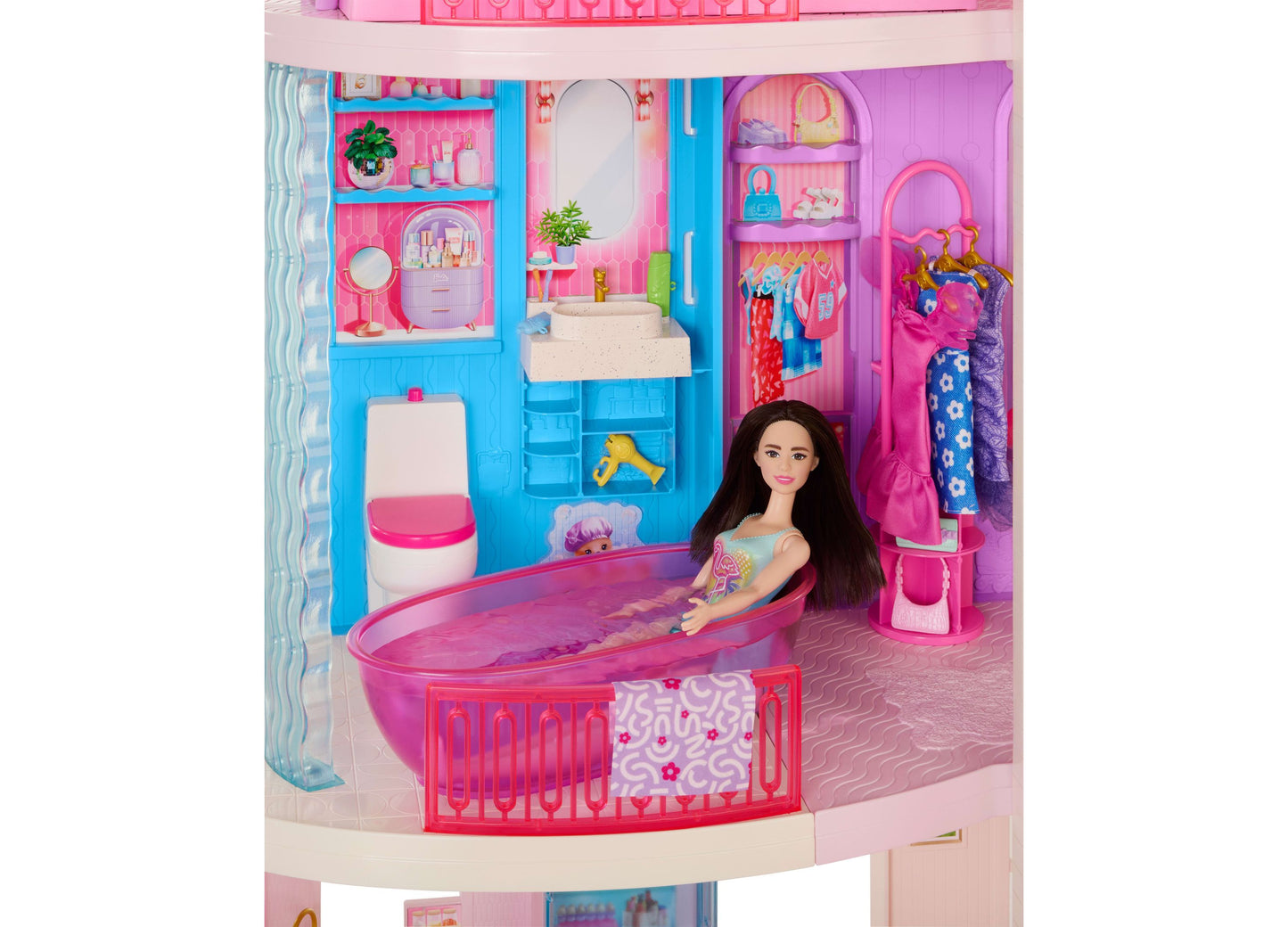 Barbie DreamHouse 3-story dollhouse with pink and blue rooms, bathtub, toilet, closet, pools, and Barbie doll