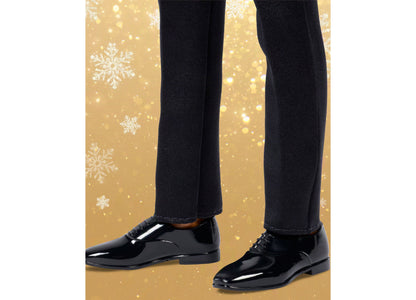 Barbie 2026 Holiday Ken 13-Inch Collectible Fashion Doll wearing black tuxedo with rooted black hair