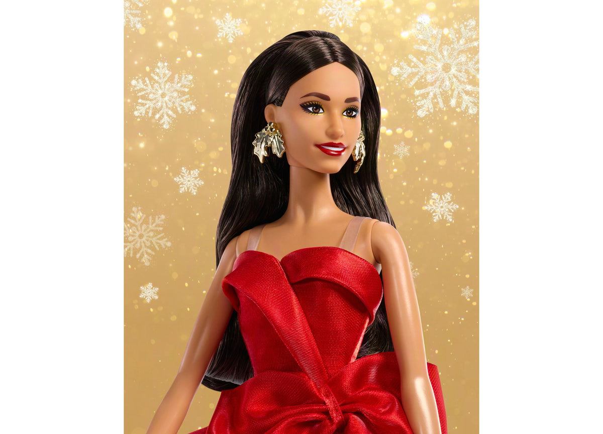 Barbie 2026 Holiday Doll wearing red bow-detail gown with long brown hair and silver drop earrings