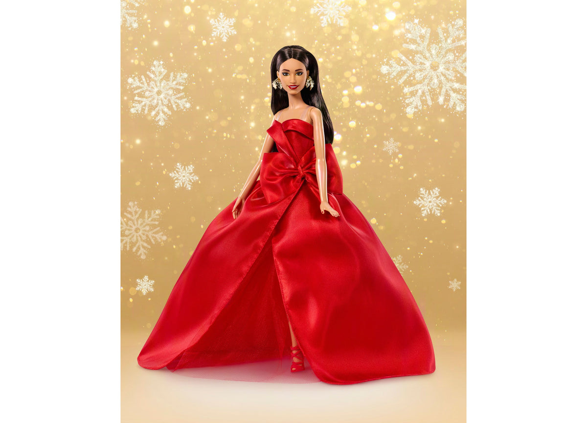 Barbie 2026 Holiday Doll in red ball gown with bow detail, long brown hair, and silver earrings