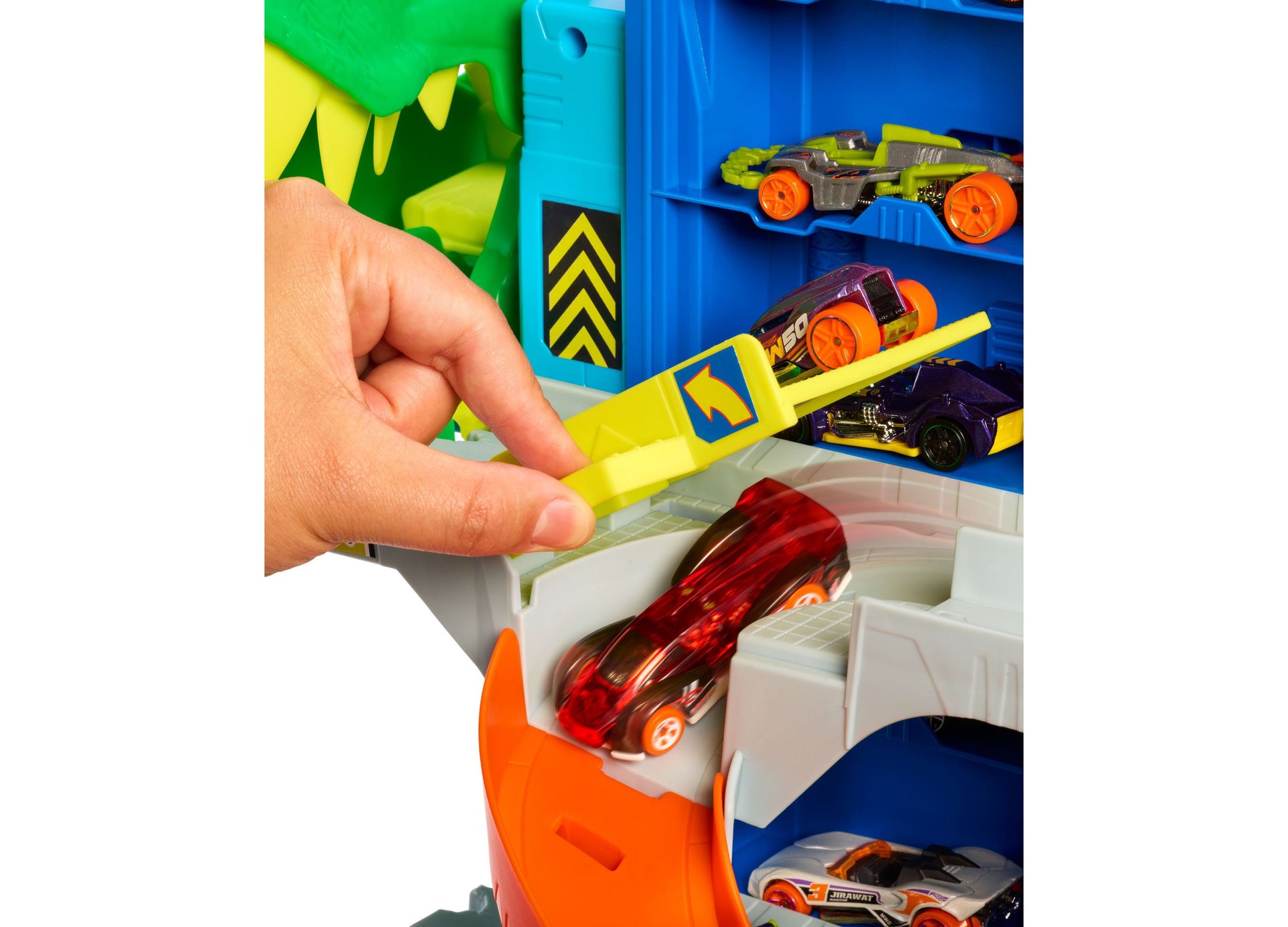 Hot Wheels T-Rex Garage Playset with colorful storage tower and die-cast cars