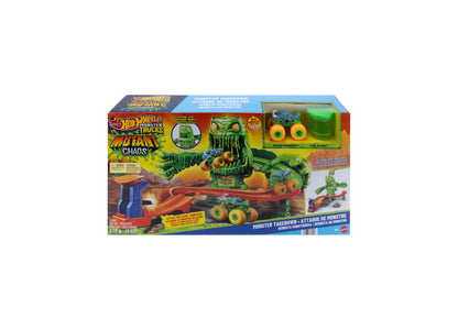 Hot Wheels Mutant Monster Takedown playset with green monster, red ramp, and yellow-wheeled vehicle