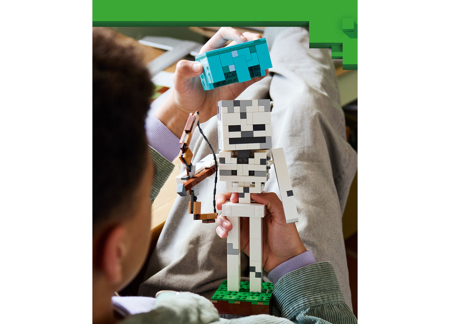 LEGO Minecraft Skeleton 21594 building set with turquoise axe and white skeleton figure