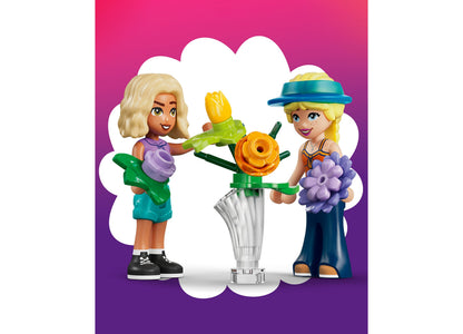 LEGO Friends Creative Flower Shop set with two minifigure characters holding colorful flowers and a vase