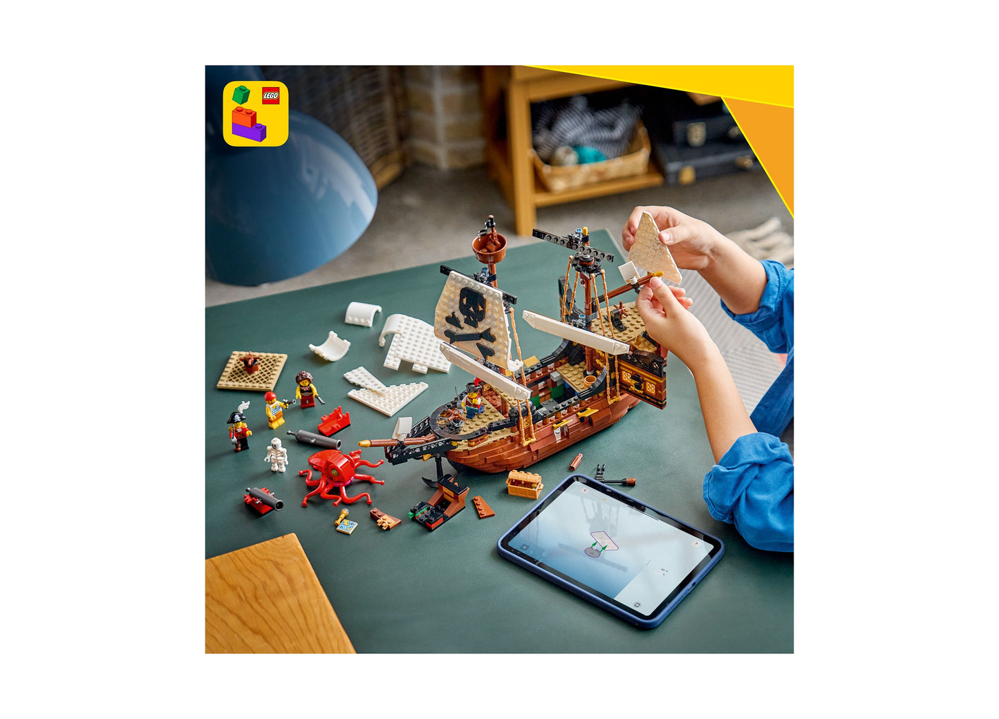 LEGO Creator 3 in 1 Pirate Ship 31387 with brown wooden vessel, red octopus, minifigures, and interactive app on tablet