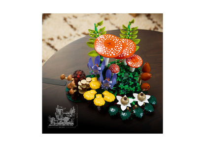 LEGO Botanicals Woodland Mushrooms set featuring red spotted mushrooms, blue flowers, yellow blooms, and green foliag...