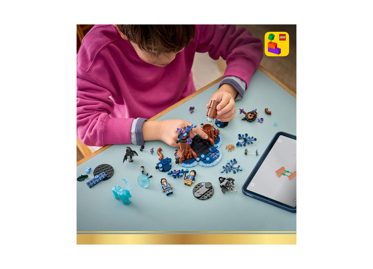 LEGO Harry Potter Forbidden Forest Expecto Patronum set with brown tree, blue pieces, and minifigures being built by ...
