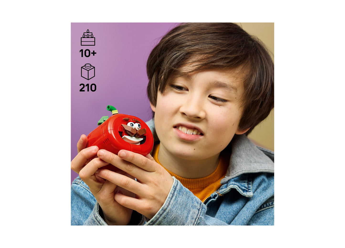 LEGO Fortnite Tomatohead 77079 red character building set held by child, 210 pieces