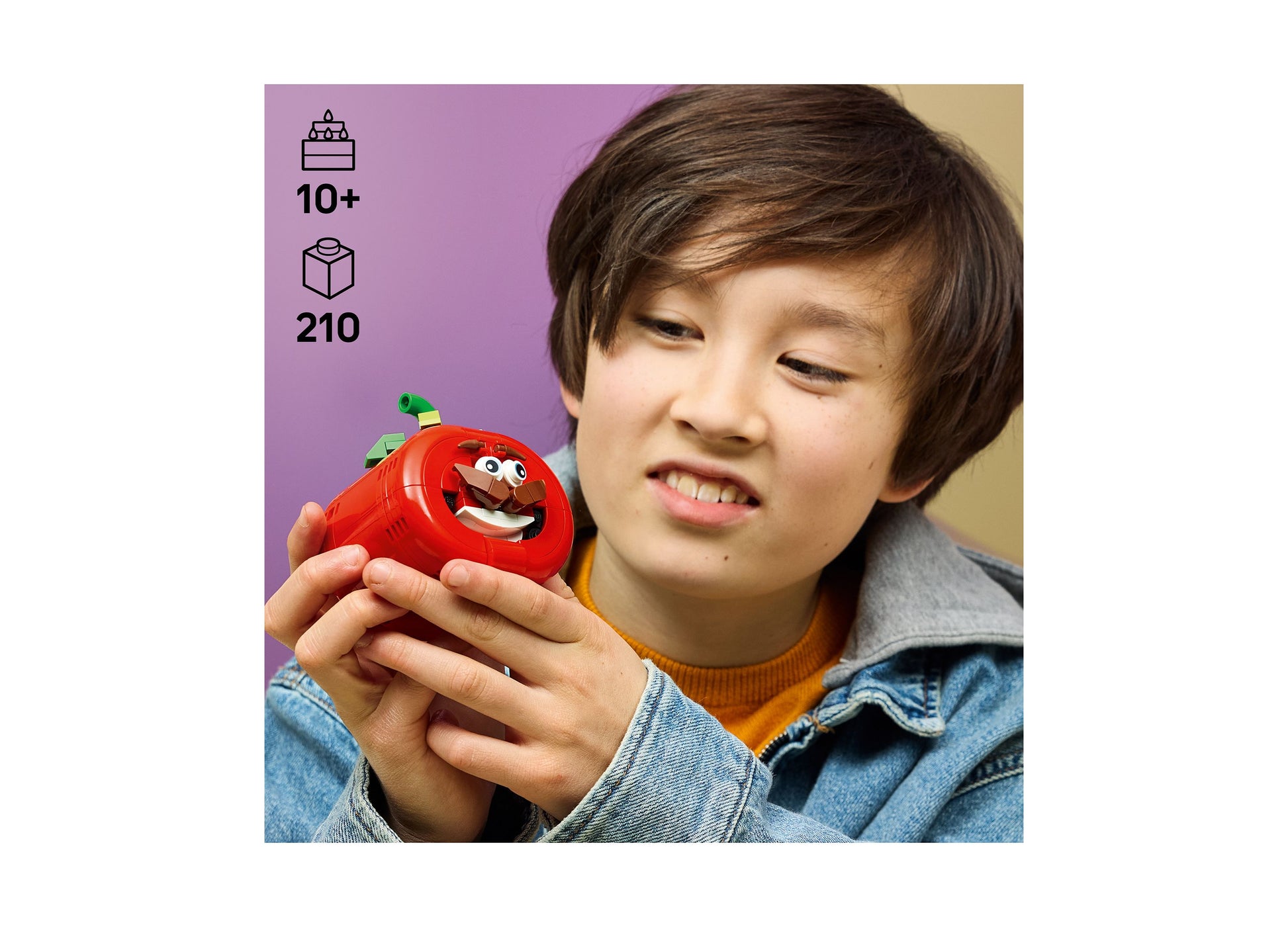 LEGO Fortnite Tomatohead 77079 red character building set held by child, 210 pieces