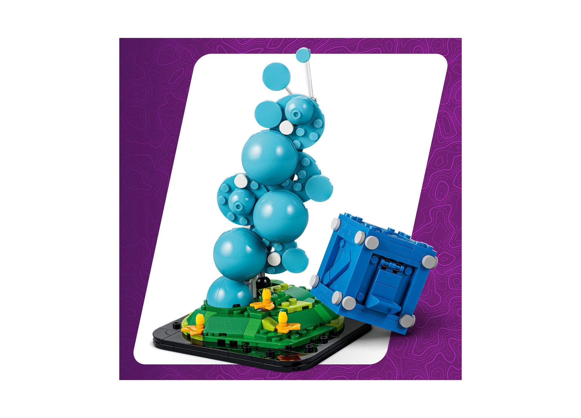 LEGO Fortnite Supply Drop 77080 building set with blue spheres, green base, and blue supply drop container