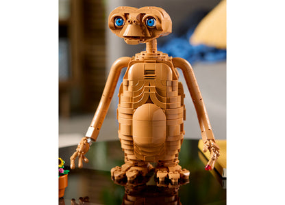 LEGO E.T. the Extra-Terrestrial 21370 building set featuring tan brick figure with blue eyes and articulated arms