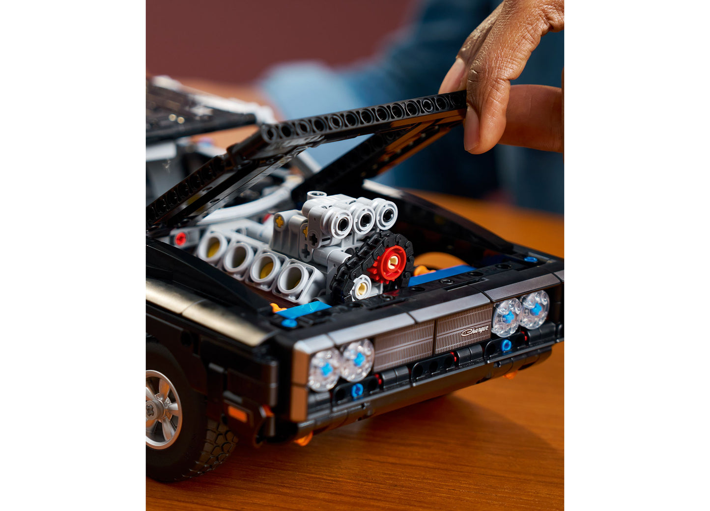 LEGO Fast and Furious Dodge Charger R/T 42231 with opening hood displaying detailed engine, black and orange car