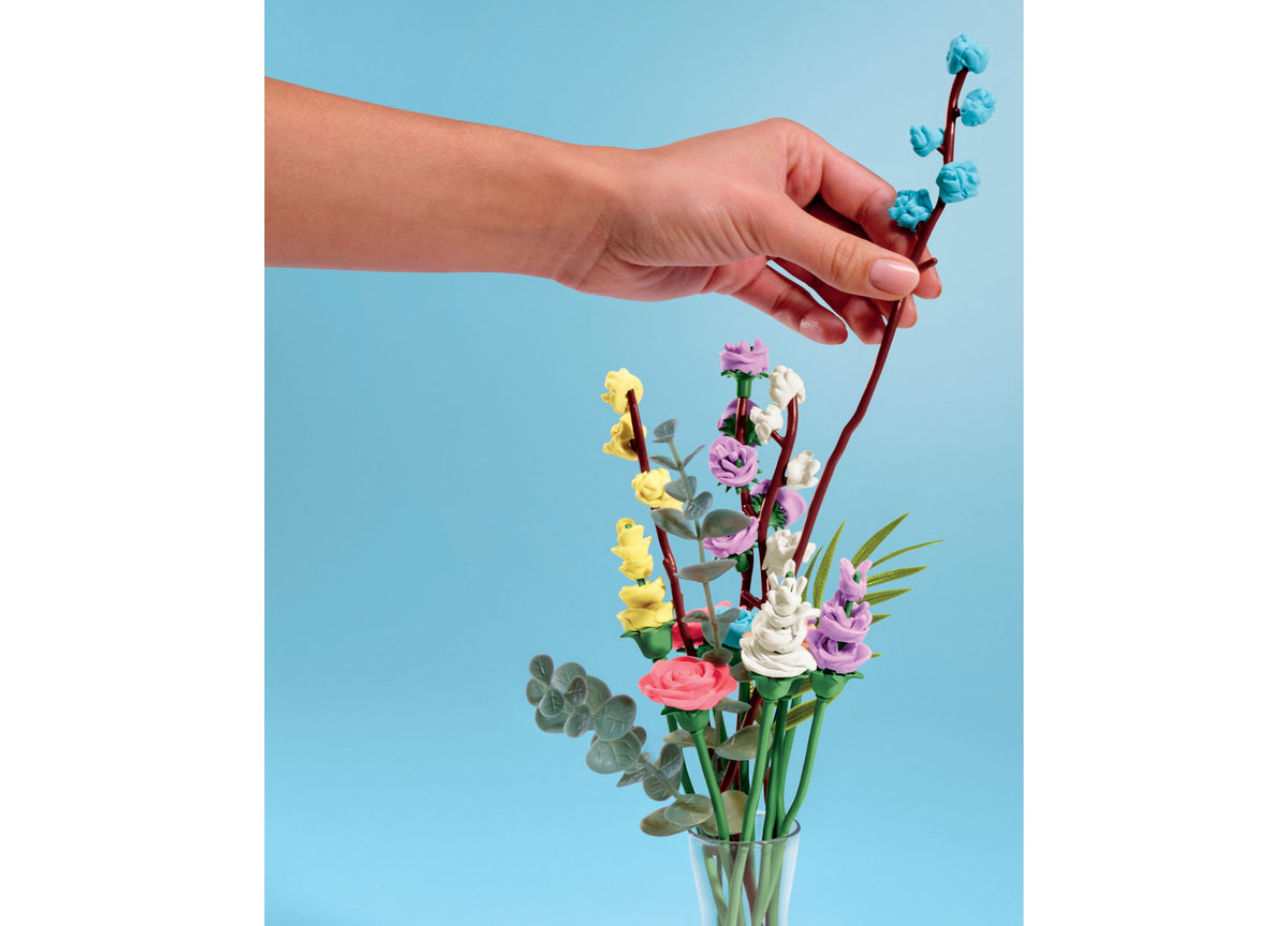 Play-Doh Blooms Wildflower Petite Bouquet Kit with colorful molded flowers in yellow, pink, purple, and white arrange...