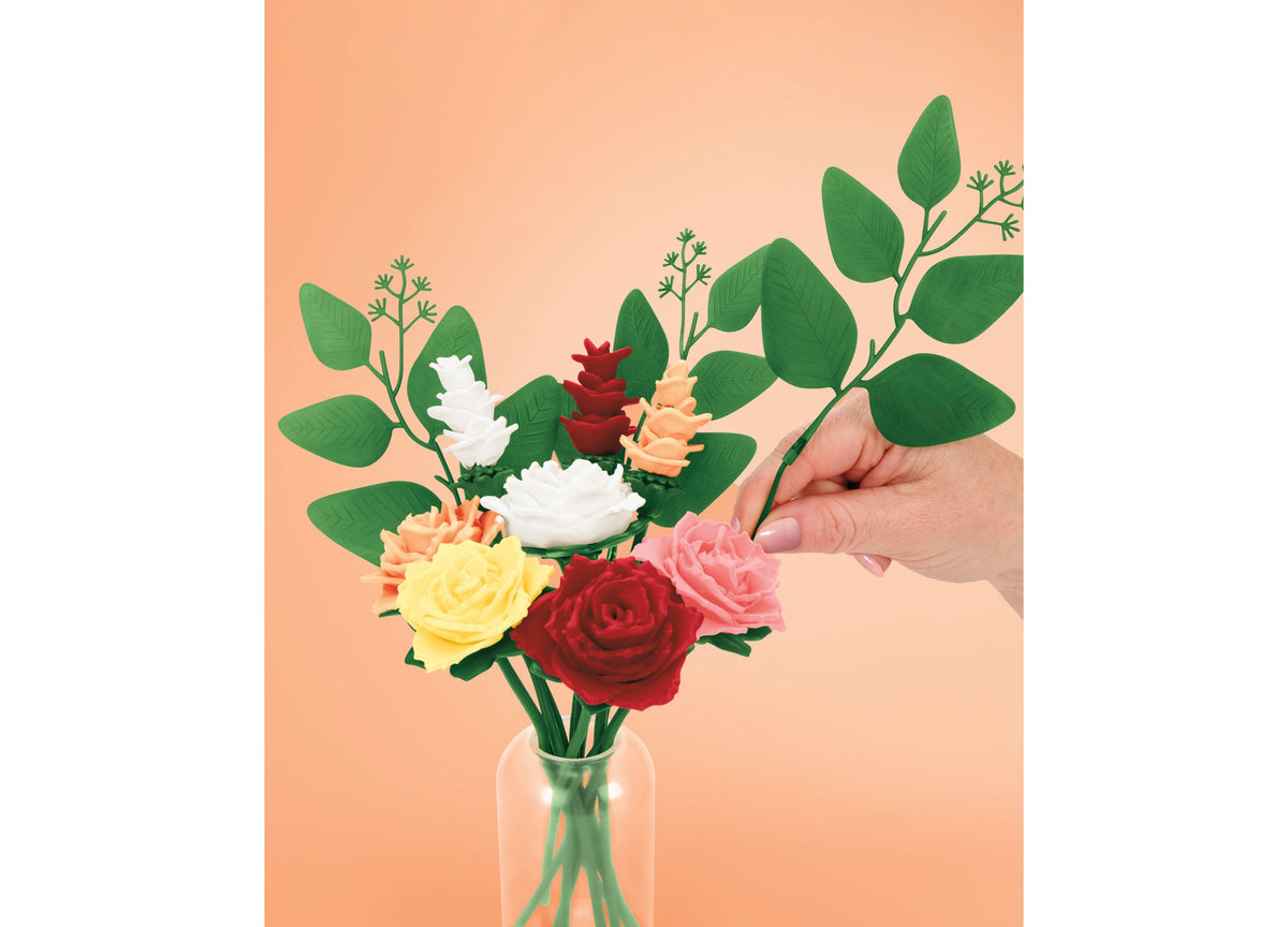 Play-Doh Blooms Rosy Petite Bouquet Flower-Making Kit with red, pink, yellow, and white moldable flowers in a clear v...