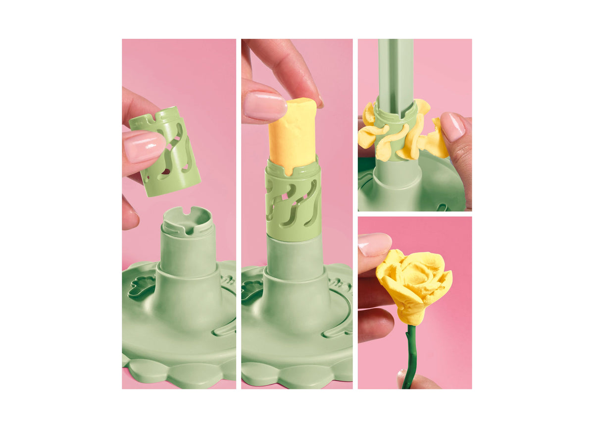 Play-Doh Blooms DIY Garden Bouquet Kit showing green flower-shaped tool, yellow flower bloom, and completed yellow fl...