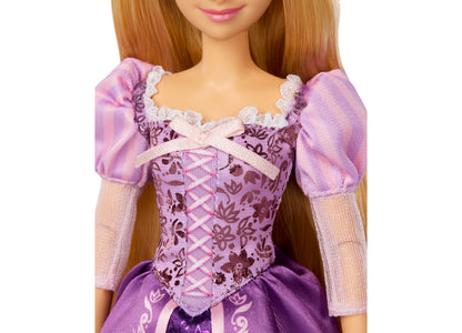 Disney Princess Rapunzel 13" doll wearing purple sparkly gown with puffed sleeves and white lace trim