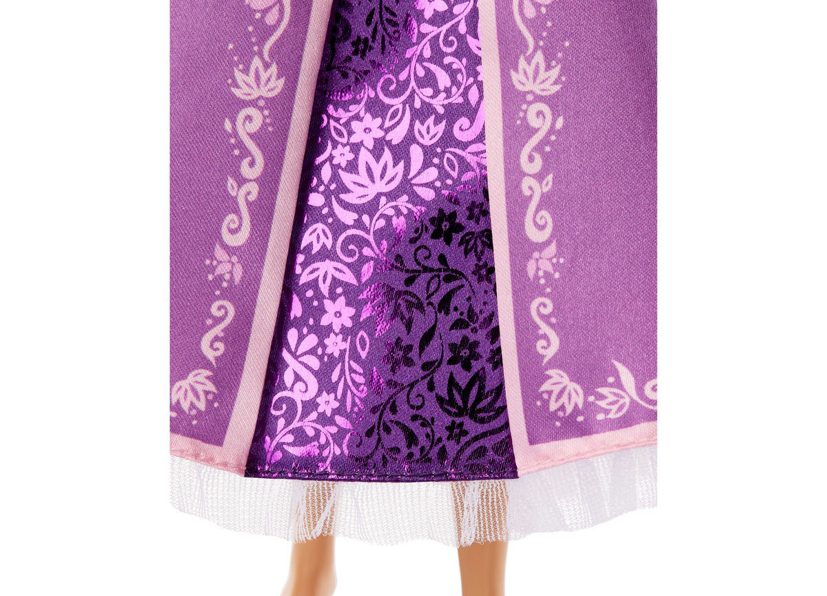 Disney Princess Rapunzel 13" doll wearing purple sparkly gown with pink trim and white hem