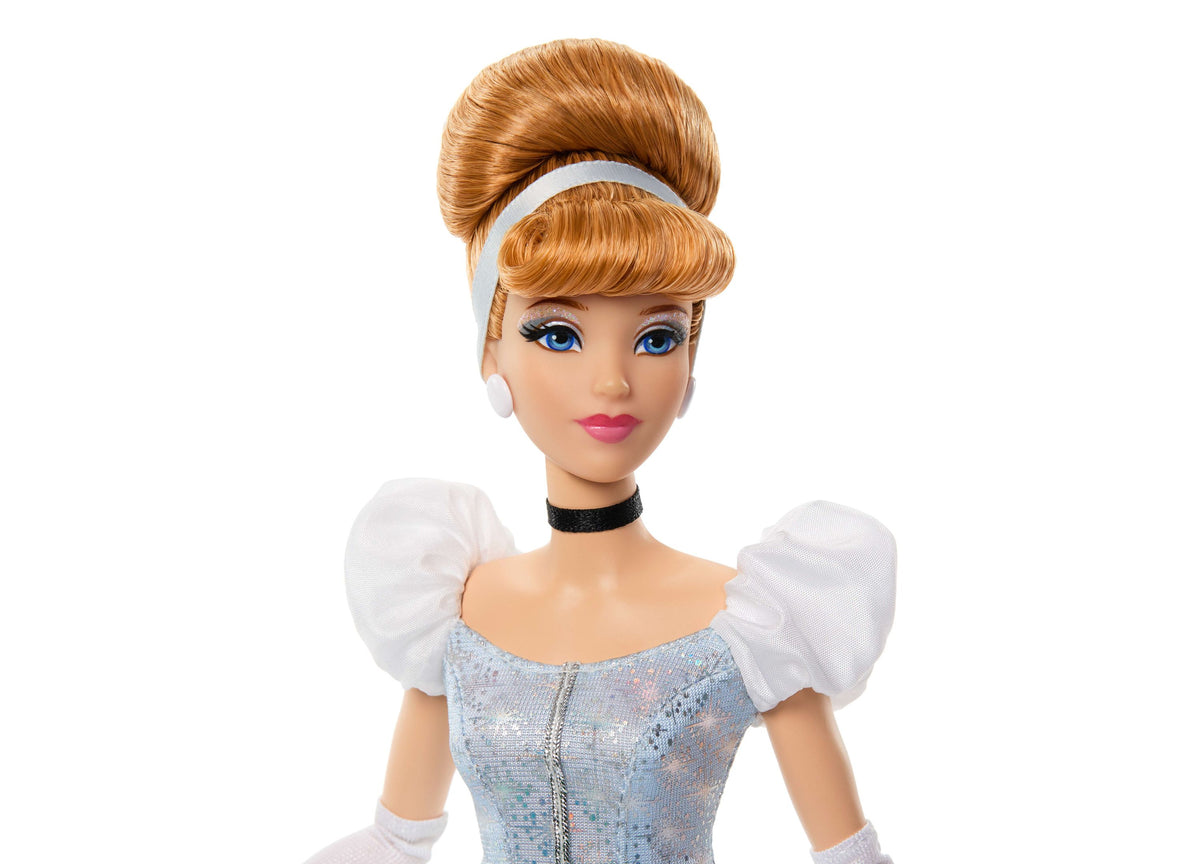 Disney Princess Cinderella Fashion Doll wearing blue ball gown with white puff sleeves, blonde hair in updo, black ch...