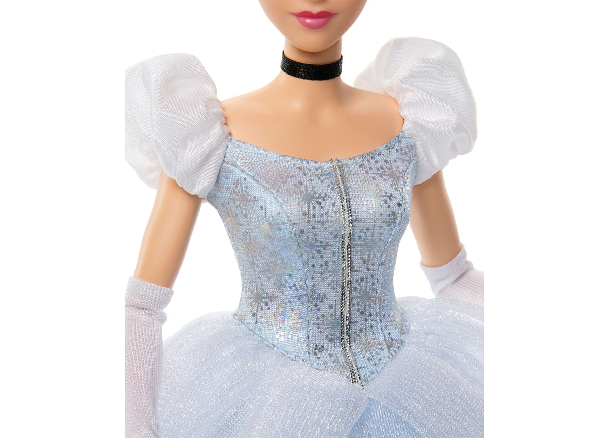 Disney Princess Cinderella Fashion Doll wearing blue ball gown with white puff sleeves, black choker, and long gloves