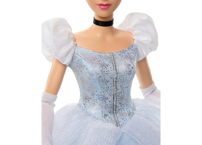 Disney Princess Cinderella Fashion Doll wearing blue ball gown with white puff sleeves, black choker, and long gloves