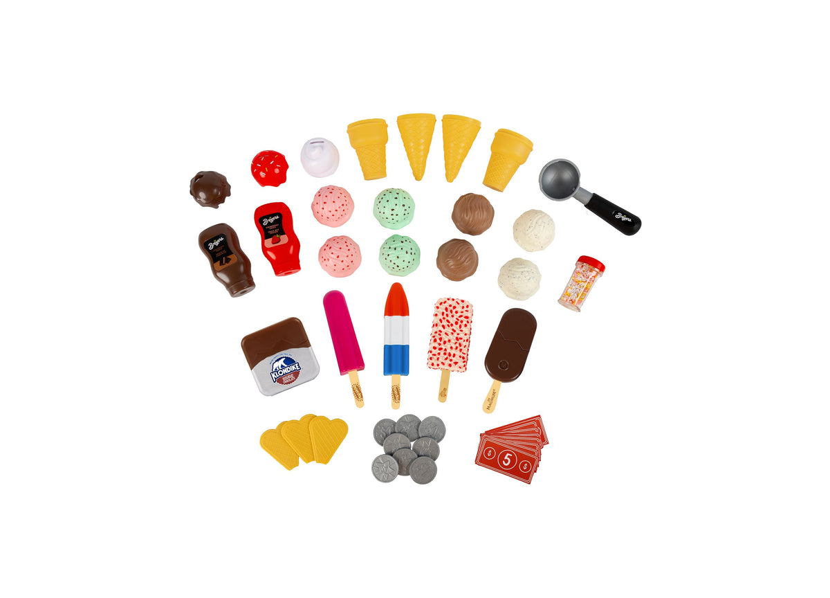 Casdon Ice Cream Parlor 35+ Piece Playset with ice cream cones, popsicles, scoops, coins, and red menu cards arranged...
