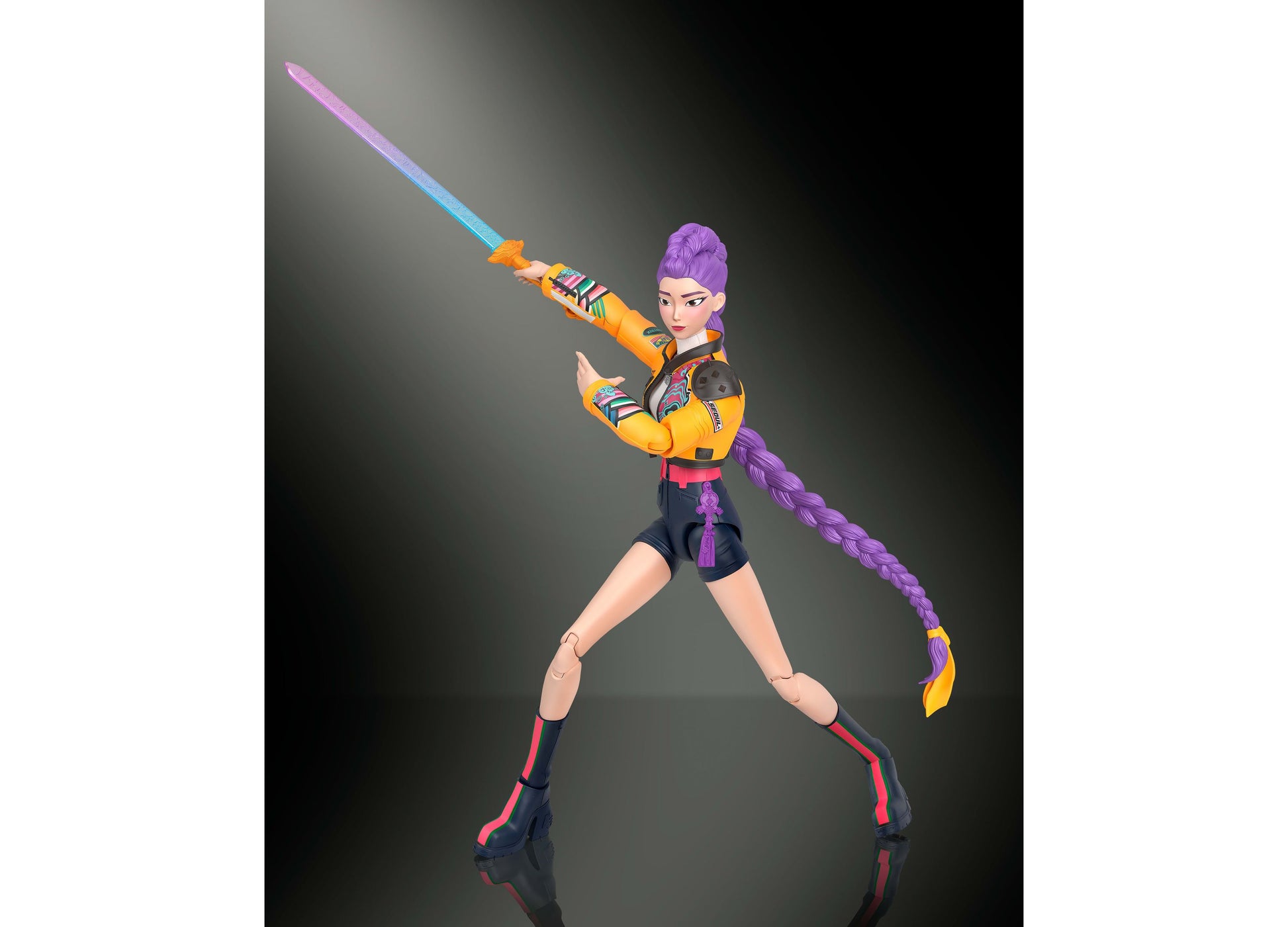 Kpop Demon Hunters Rumi 6-inch action figure with purple hair, yellow armor, articulated joints, and interchangeable ...