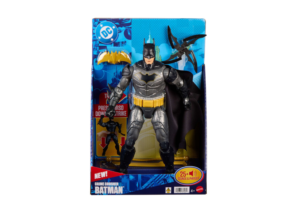 Batman 12" action figure in gray and black suit with yellow belt, displayed in packaging with DC logo a...