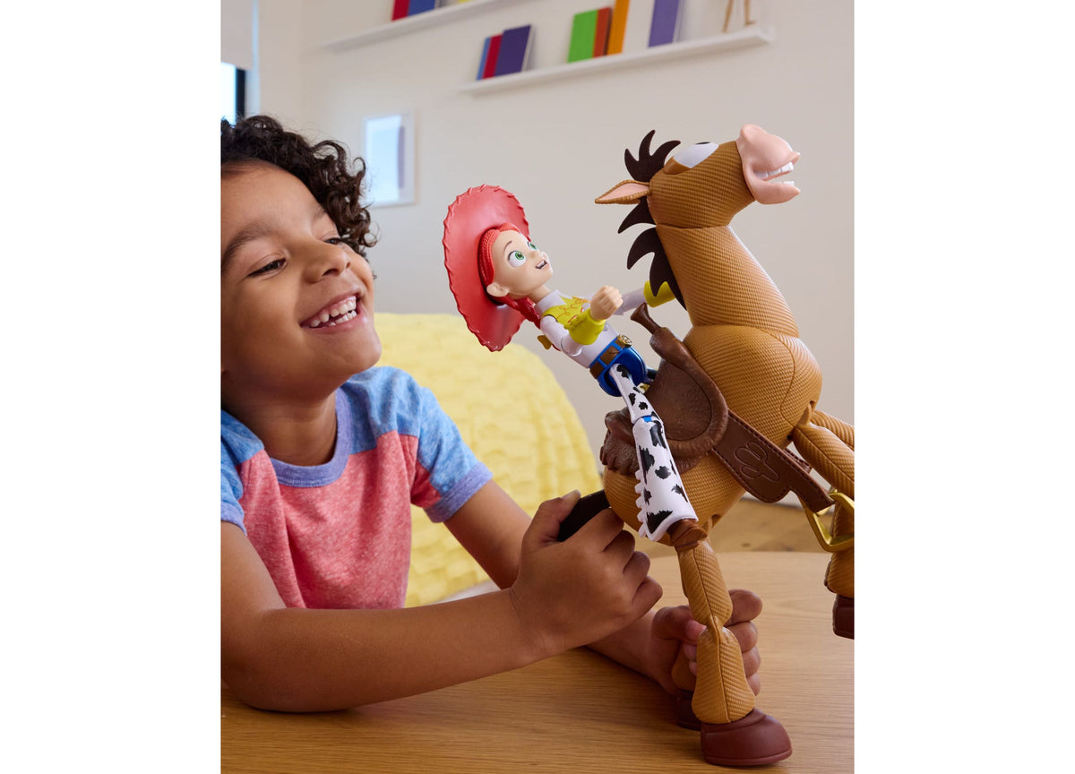 Child playing with Toy Story Bullseye 12-inch figure with brown horse and small Jessie character with red hat