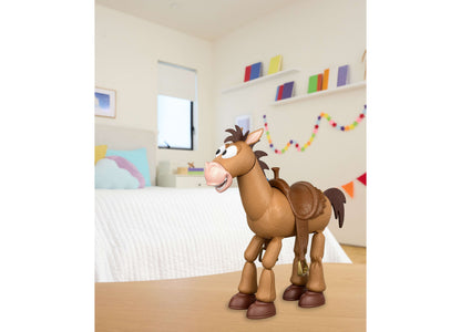 Toy Story Bullseye 12" figure with brown horse character on a surface in colorful playroom