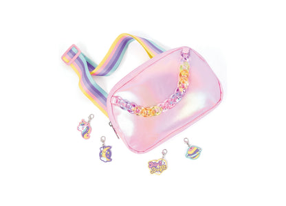 Make It Real DIY Chain and Charms Belt Bag in pink iridescent with rainbow strap, shown with four colorful clip-on ch...