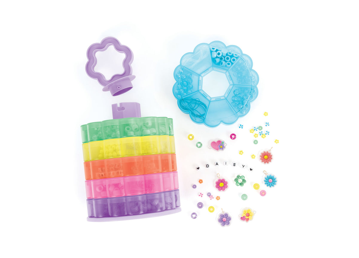 Make It Real Flower Tower Bead Storage with seven rainbow-colored stacking tiers, purple star-shaped handle, blue flo...