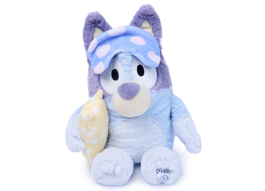 Bluey Bedtime 13-Inch Interactive Plush wearing blue sleep mask and holding pillow