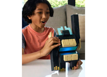 Child playing with Minecraft Twisted Warden & Soul Corrupted Creeper Lights & Sounds Slam Attack Figures 2-Piece set