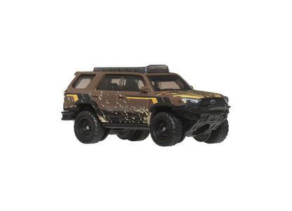 Matchbox Desert Chase Escape 4-piece die-cast vehicle set featuring brown and gold Toyota 4Runner with roof rack